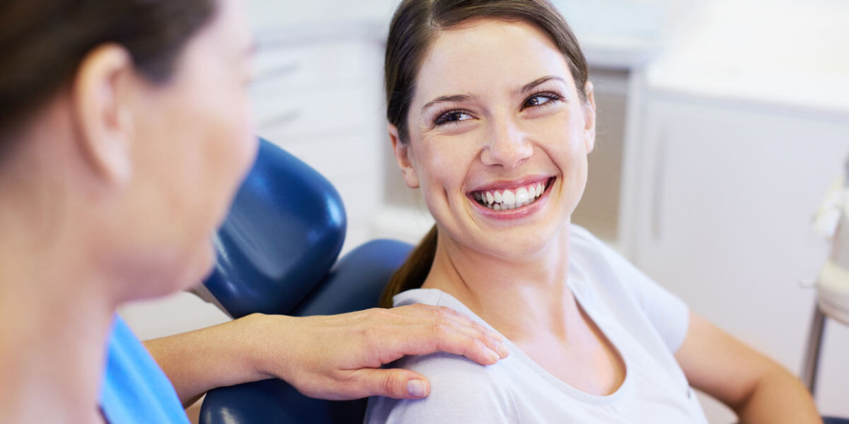 Smiling Male Patient with Xray In Background